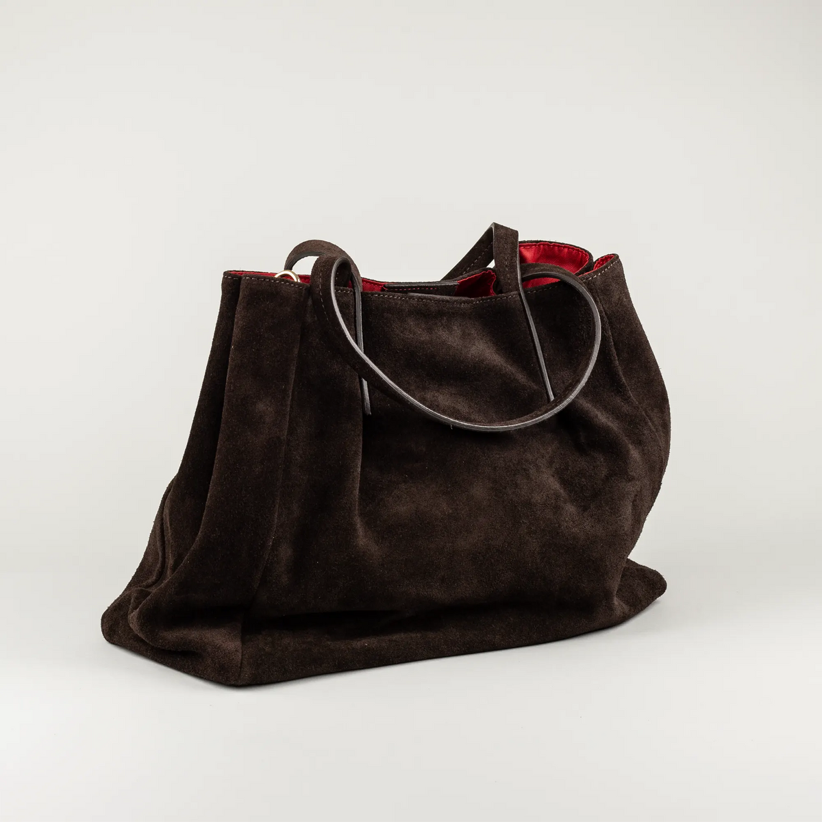 Aruci – Shopper aus dunkelbraunem Wildleder mit rotem Futter