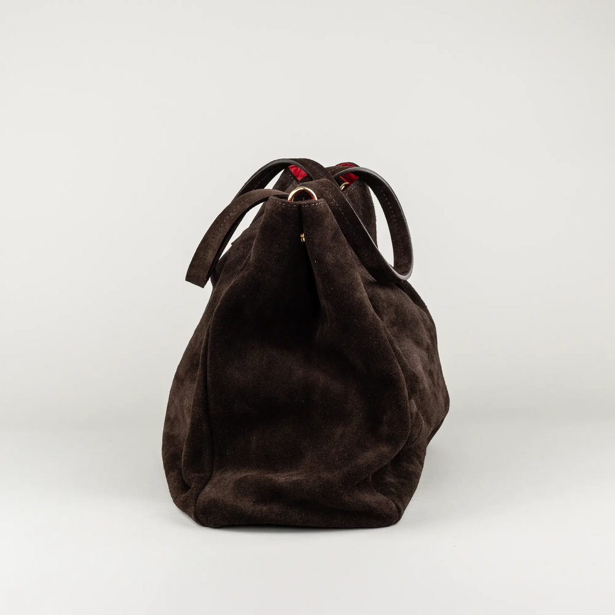 Aruci – Shopper aus dunkelbraunem Wildleder mit rotem Futter