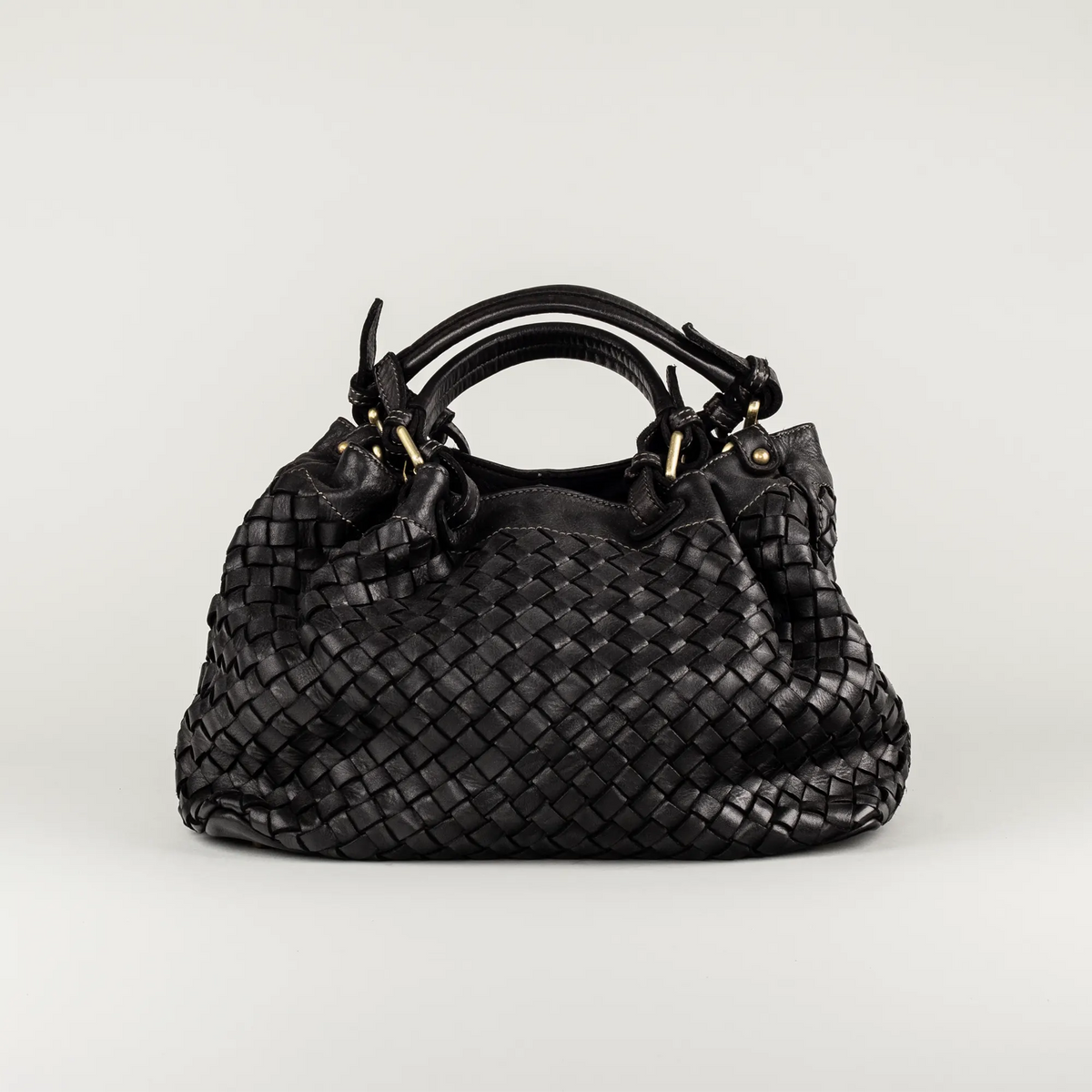 Aruci – Damenhand- und Schultertasche aus geflochtenem Leder