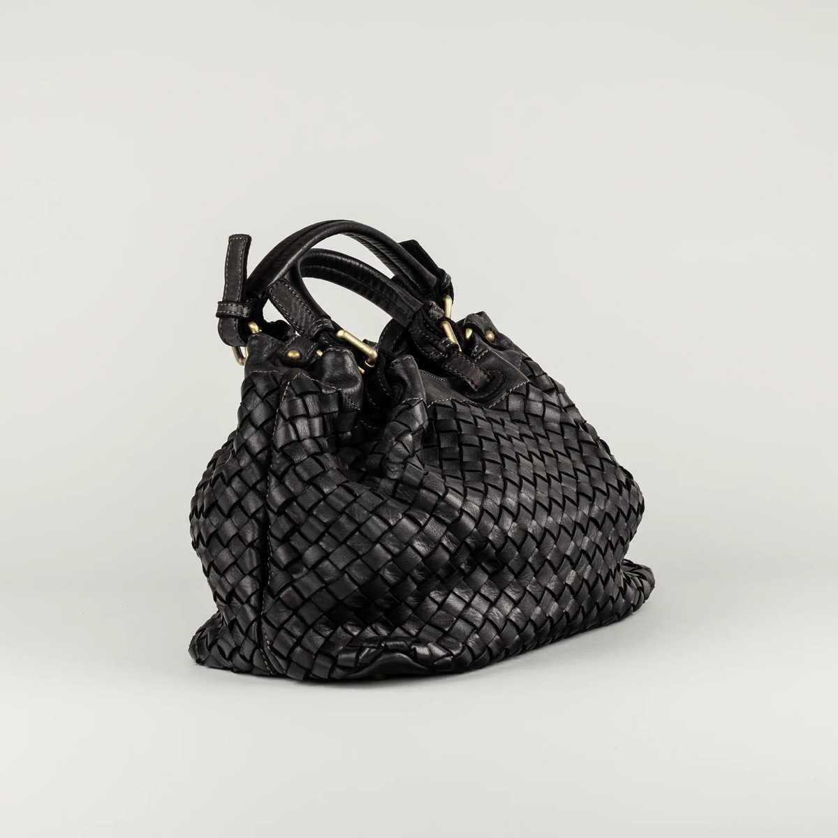 Aruci – Damenhand- und Schultertasche aus geflochtenem Leder